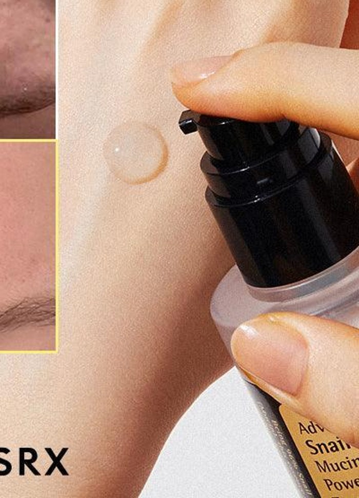 COSRX Advanced Snail 96 Mucin Power Essence being dispensed onto the back of a hand to show texture